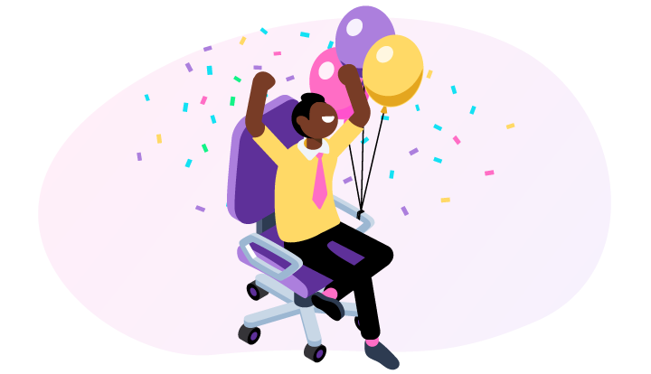 New hire sitting in a chair with balloons.